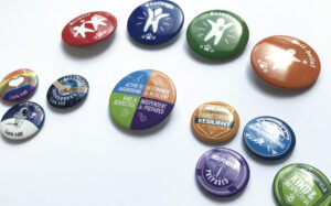 range of school values badge examples, featuring values such as respect and nurture